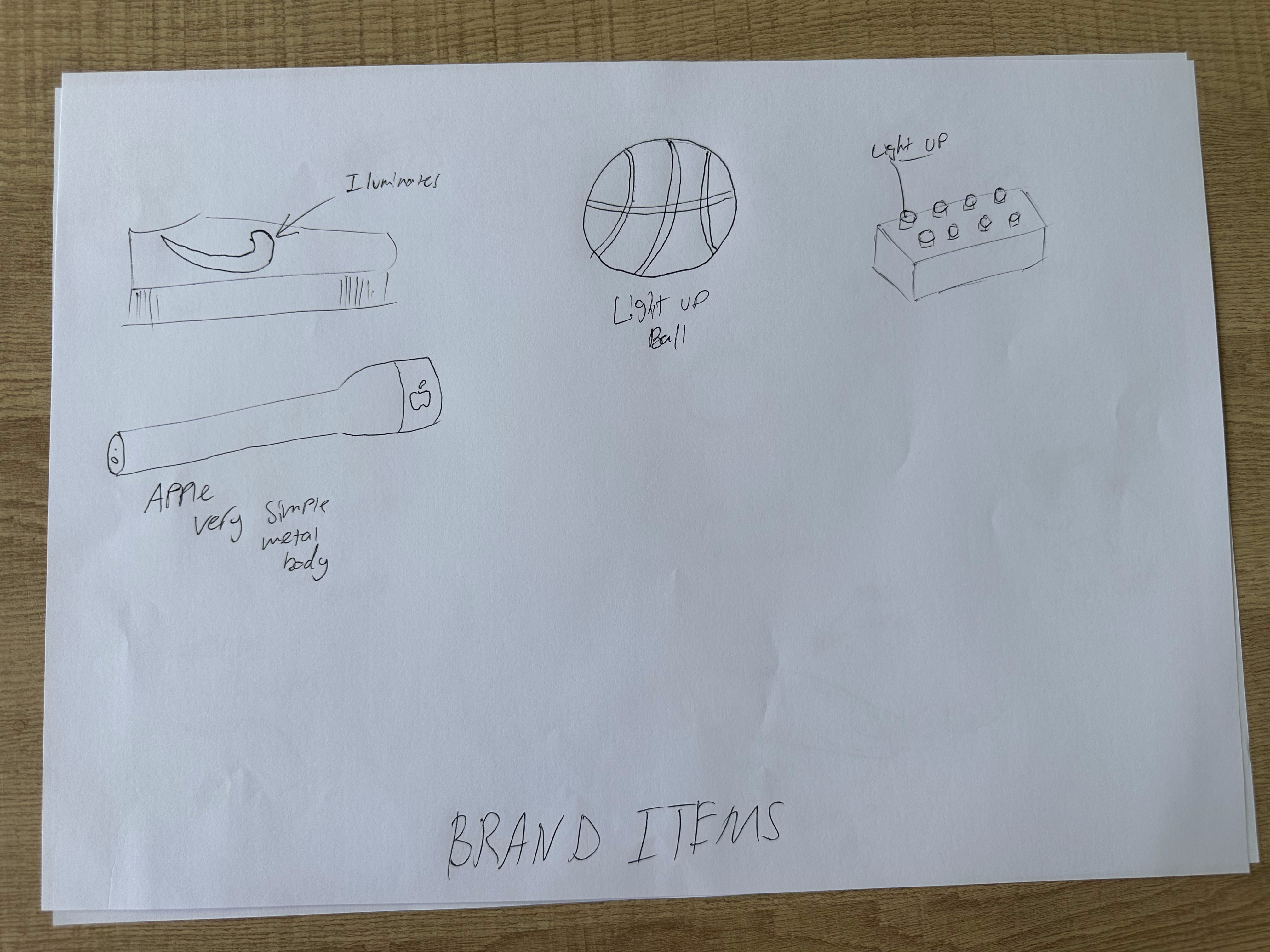Brand style torch ideation sketches: Apple-style minimal torch, light-up ball, light-up brick